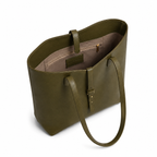 Fashionable women's tote bag with buckle strap.